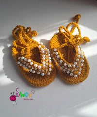 Mustard pearl flip-flops
